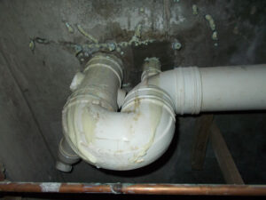 PU injection grouting into a leaking concrete crack