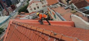 Waterproofing treatment to roof flashing