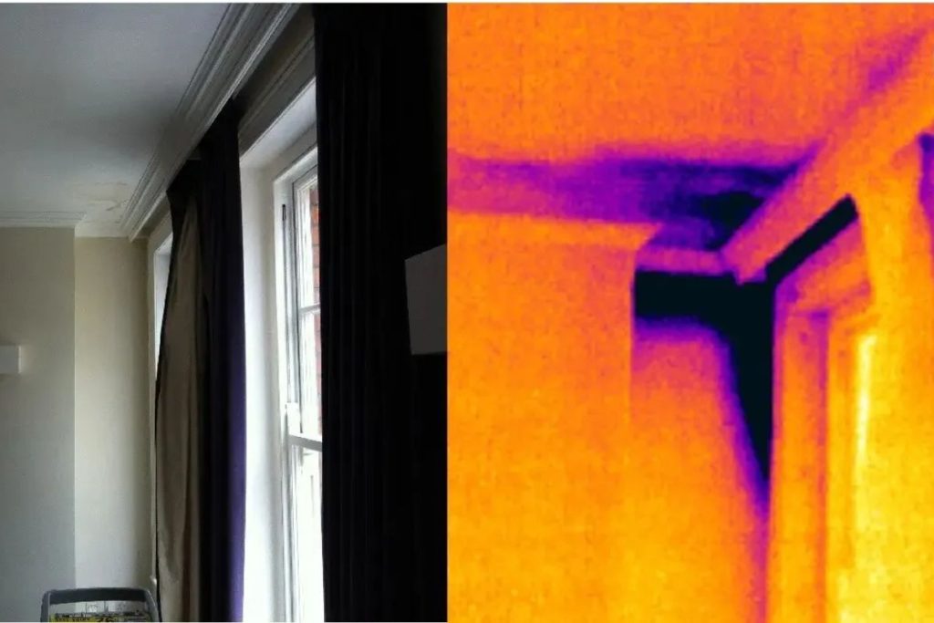 Roof Doctors technician using a moisture meter to diagnose a ceiling leak in Singapore